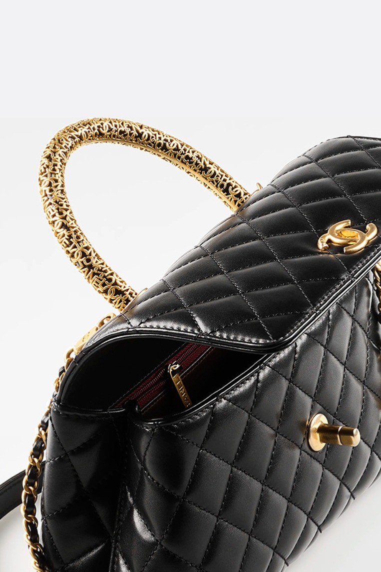 Chanel, Limited Edition Golden Top Handle Quilted Caviar…