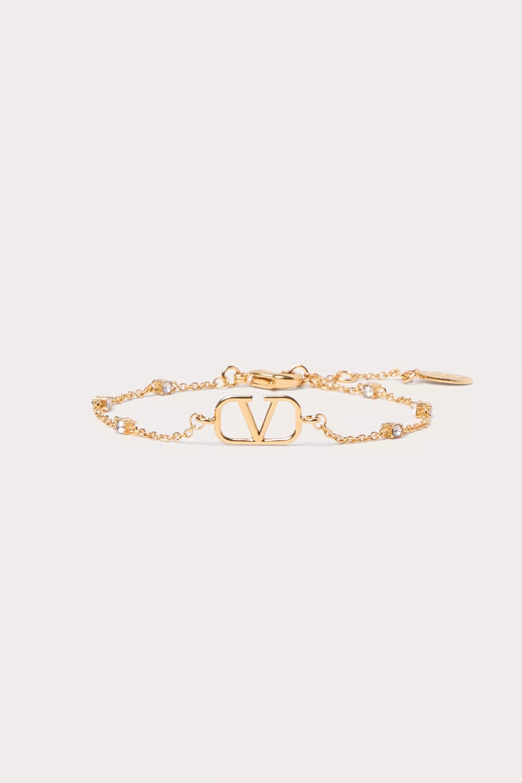 VLOGO SIGNATURE METAL AND SWAROVSKI® CRYSTAL BRACELET - Gold