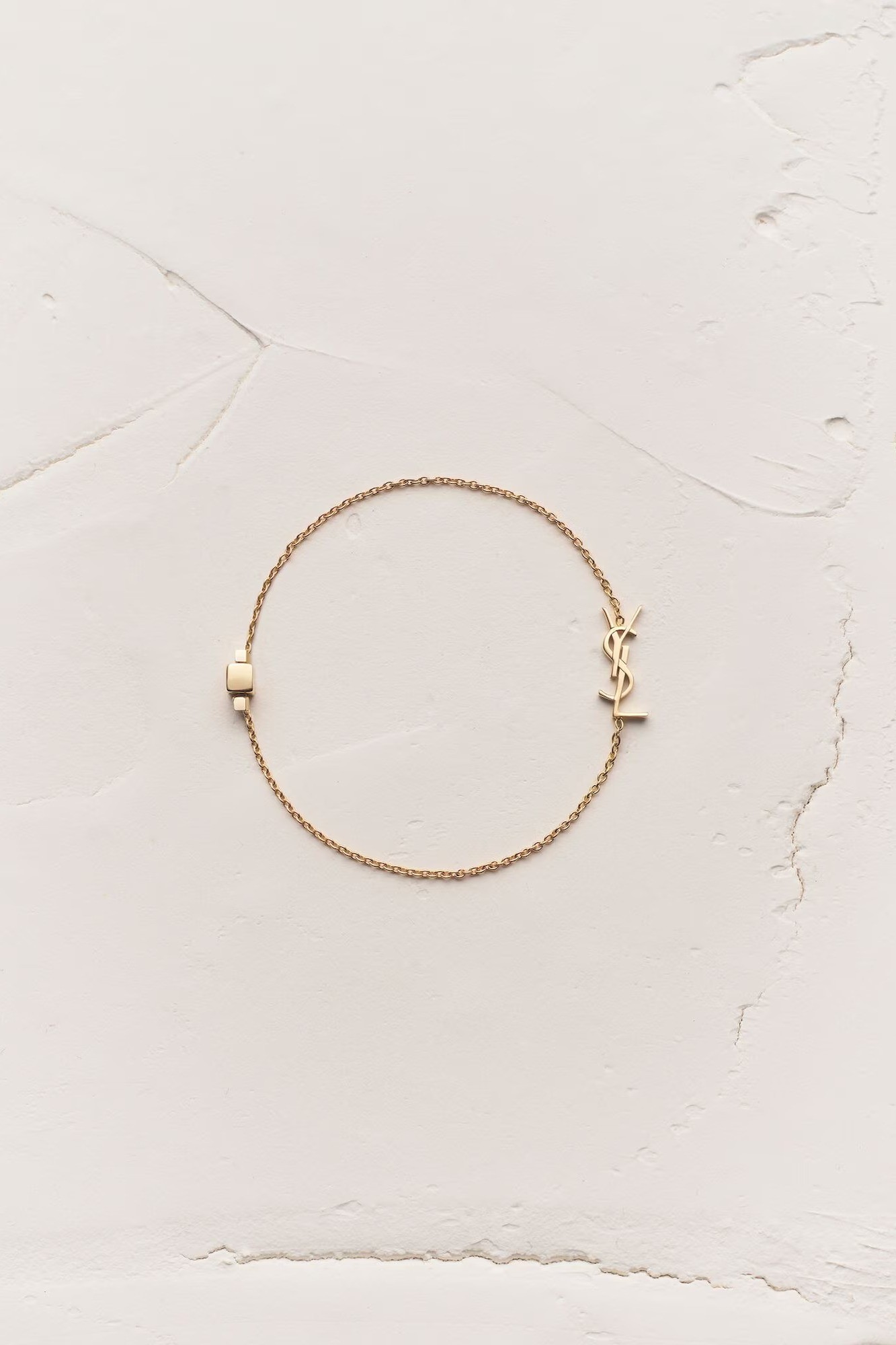 Saint Laurent - CASSANDRE bracelet in 18K - yellow gold